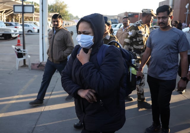 An Indian immigrant deported from the U.S. walks out of the airport in Ahmedabad, India February 6, 2025. REUTERS/Amit Dave