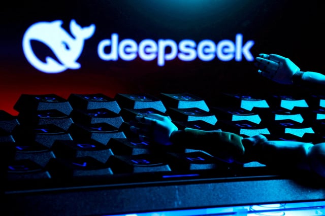 The deepSeek logo, a keyboard, and robot hands are seen in this illustration taken January 27, 2025. REUTERS/Dado Ruvic/Illustration/File Photo