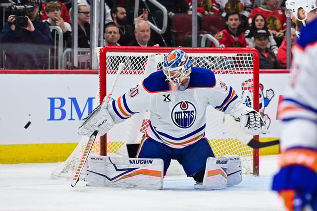 Feb 5, 2025; Chicago, Illinois, USA; Edmonton Oilers goaltender Calvin Pickard (30) makes a save against the Chicago Blackhawks during the first period at the United Center. Mandatory Credit: Daniel Bartel-Imagn Images