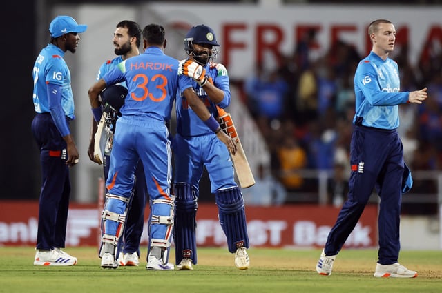 Cricket - First One Day International - India v England - Vidarbha Cricket Association Stadium, Nagpur, India - February 6, 2025 India's Ravindra Jadeja and Hardik Pandya celebrate after the match REUTERS/Anushree Fadnavis