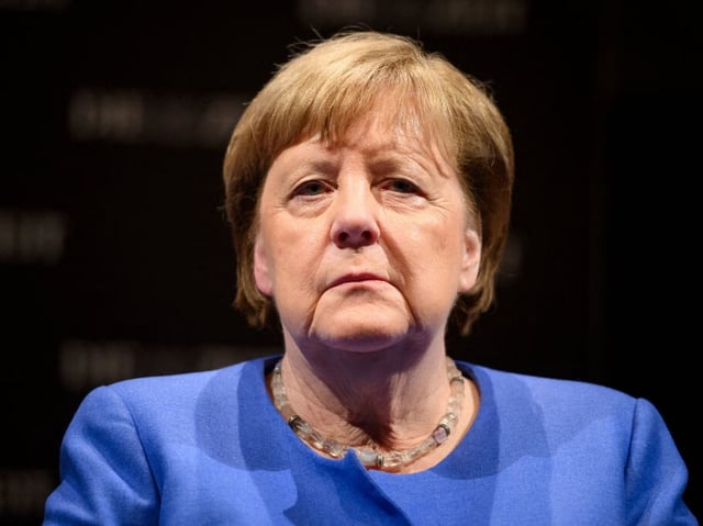 Former German chancellor Angela Merkel takes part in a talk hosted by German newspaper Die Zeit at the Deutsches Schauspielhaus theatre in Hamburg, northern Germany on February 5, 2025. Former German chancellor Angela Merkel on January 30, 2025 criticised Friedrich Merz, who succeeded her as leader of the conservative CDU party, for relying on far-right support to pass a parliamentary motion demanding tougher immigration rules. (Photo by Gregor Fischer / AFP) (Photo by GREGOR FISCHER/AFP via Getty Images)