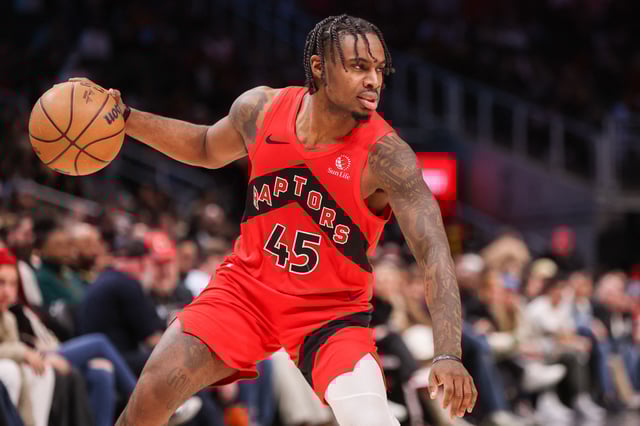Jan 23, 2025; Atlanta, Georgia, USA; Toronto Raptors guard Davion Mitchell (45) dribbles against the Atlanta Hawks in the fourth quarter at State Farm Arena. Mandatory Credit: Brett Davis-Imagn Images/File Photo