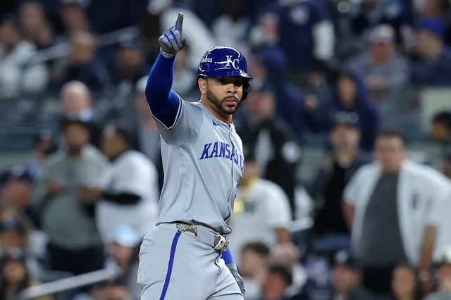 Oct 7, 2024; Bronx, New York, USA; Kansas City Royals outfielder Tommy Pham (22) reacts after a RBI single against the New York Yankees in the fourth inning during game two of the ALDS for the 2024 MLB Playoffs at Yankee Stadium. Mandatory Credit: Brad Penner-Imagn Images/File Photo