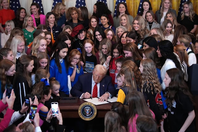 President Donald Trump signs the “No Men in Women’s Sports” executive order Wednesday at the White House.