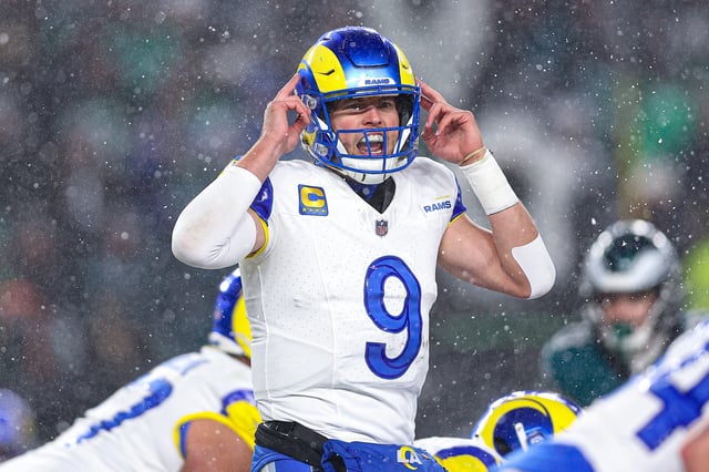 Los Angeles Rams quarterback Matthew Stafford calls a play at the line of scrimmage against the Philadelphia Eagles.