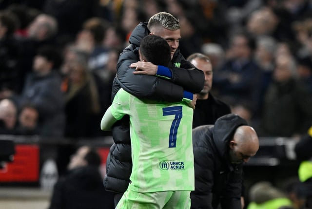 Soccer Football - Copa del Rey - Quarter Final - Valencia v FC Barcelona - Estadio de Mestalla, Valencia, Spain - February 6, 2025 FC Barcelona's Ferran Torres celebrates with Dani Olmo after scoring their fourth goal to complete his hat-trick REUTERS/Pablo Morano