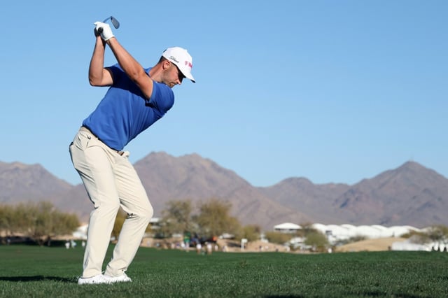 American Wyndham Clark plays the 15th hole on the way to the first-round lead in the US PGA Tour Phoenix Open