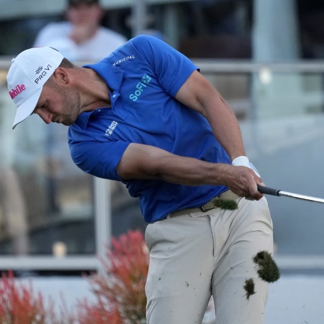 Wyndham Clark hits his tee shot at the 16th hole during the first round of the Waste Management Phoenix Open PGA Tour golf tournament at the TPC Scottsdale Thursday, Feb. 6, 2025, in Scottsdale, Ariz. (AP Photo/Ross D. Franklin)