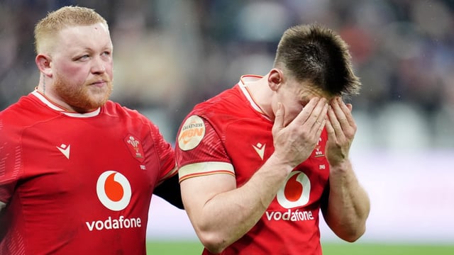 Wales’ Kieron Assiratti and Josh Adams stand dejected after losing 43-0 to France in their Six Nations opener last week