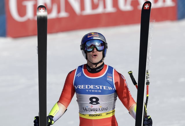 Alpine Skiing - FIS Alpine World Ski Championships - Men's Super G - Saalbach, Austria - February 7, 2025 Switzerland's Marco Odermatt reacts after their run REUTERS/Leonhard Foeger