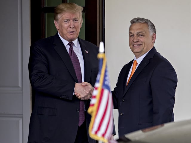 U.S. President Donald Trump, left, shakes hands with Viktor Orban, Hungary's prime minister, at the West Wing of the White House in Washington, D.C., U.S., on Monday, May 13, 2019. Trump is meeting with the nationalist leader of Hungary despite bipartisan objections from Congress, as the U.S. seeks to steer the Central European nation and NATO member away from Russia and China. Photographer: Andrew Harrer/Bloomberg
