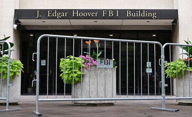 Security fencing is seen outside the Federal Bureau of Investigation headquarters in Washington, DC on August 15, 2022.