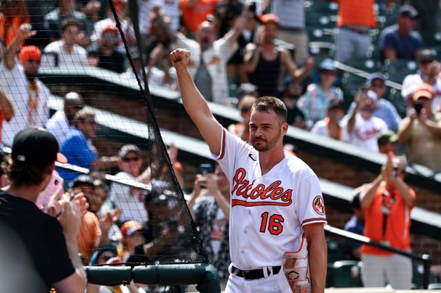 Baltimore Orioles designated hitter Trey Mancini (16) acknowledges the crowd during the ninth inning of a baseball game against the Tampa Bay Rays, Thursday, July 28, 2022, in Baltimore. (AP Photo/Terrance Williams)