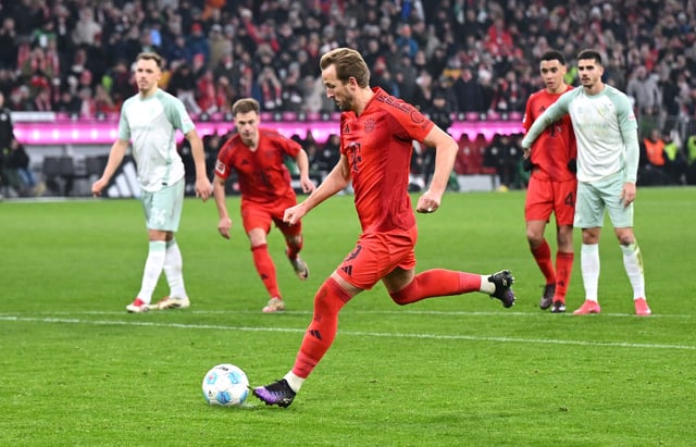 Soccer Football - Bundesliga - Bayern Munich v Werder Bremen - Allianz Arena, Munich, Germany - February 7, 2025 Bayern Munich's Harry Kane scores their third goal from the penalty spot REUTERS/Angelika Warmuth