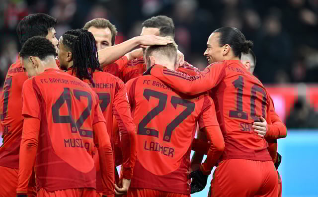 Soccer Football - Bundesliga - Bayern Munich v Werder Bremen - Allianz Arena, Munich, Germany - February 7, 2025 Bayern Munich's Leroy Sane celebrates scoring their second goal with teammates REUTERS/Angelika Warmuth