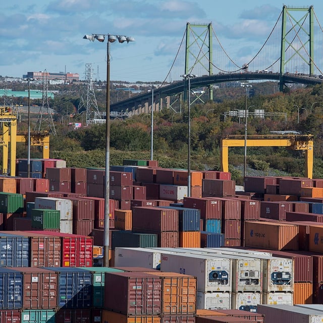 Shipping containers are stacked at the Fairview Cove Container Terminal in Halifax on Friday, Oct. 19, 2018. A major U.S. shipper is turning away from the Halifax port in favour of U.S. harbours due to ongoing blockades that have shut down Canadian National Railway Co.'s eastern network. THE CANADIAN PRESS/Andrew Vaughan