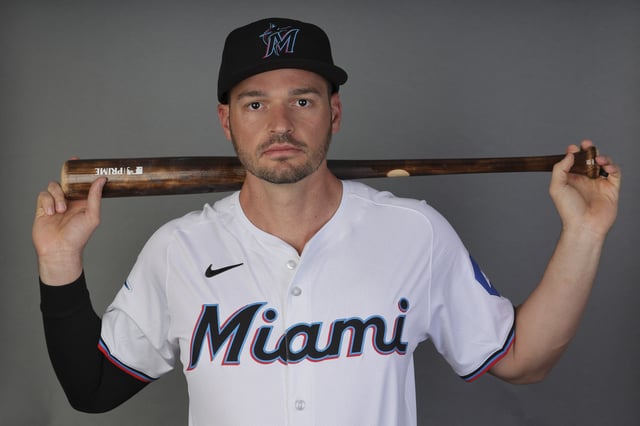 Feb 22, 2024; Jupiter, FL, USA; Miami Marlins infielder Trey Mancini (13) poses for a photo during photo day at the Marlins Player Development & Scouting Complex. Mandatory Credit: Sam Navarro-USA TODAY Sports/File Photo