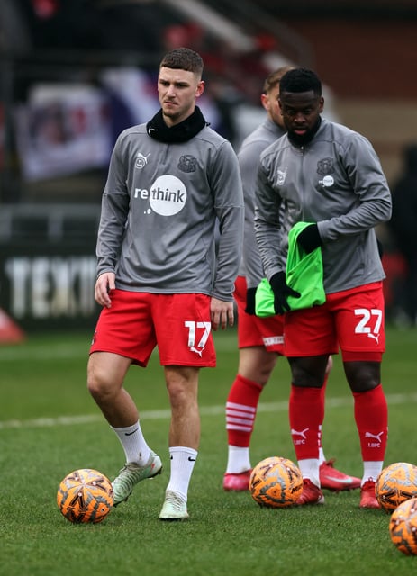 Soccer Football - FA Cup - Fourth Round - Leyton Orient v Manchester City - Brisbane Road, London, Britain - February 8, 2025 Leyton Orient's Jamie Donley and Leyton Orient's Diallang Jaiyesimi during the warm up before the match REUTERS/David Klein