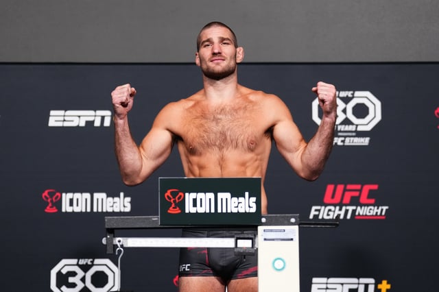 In this UFC handout, Sean Strickland poses on the scale during the UFC Fight Night weigh-in at UFC Apex on June 30, 2023 in Las Vegas, Nevada. Photo by Chris Unger/Zuffa LLC