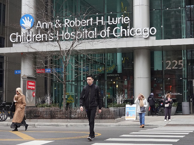 Pedestrians walk past an entrance to the Lurie Children's Hospital on February 07, 2024 in Chicago, Illinois. The hospital's computer network has been offline for eight days following what is believed to be a cyberattack. (Scott Olson/Getty)