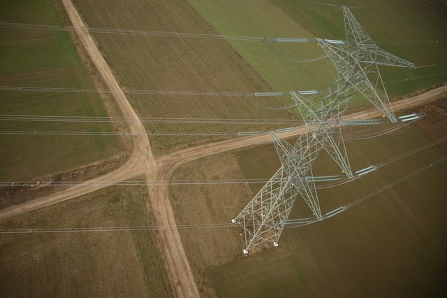 Polish transmission system operator PSE (Polskie Sieci Energetyczne) power lines are seen near Lomza, Poland, February 6, 2025. REUTERS/Kacper Pempel/File Photo