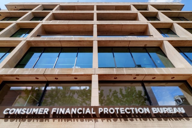 The entrance to the Consumer Financial Protection Bureau (CFPB) headquarters building is seen on August 18, 2024, in Washington, DC. (Photo by J. David Ake/Getty Images)