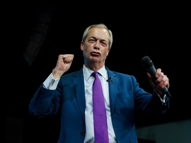 HOUGHTON LE SPRING, ENGLAND - FEBRUARY 01: Reform UK leader Nigel Farage MP reacts after his speech during the Reform UK County Durham Conference at the Sunderland Live Venue on February 01, 2025 in Houghton le Spring, England. Reform UK is holding a series of rallies across the UK. This week's comes after a Reform fundraiser held earlier this week at Oswald's private member's club in Mayfair, London, where leader Nigel Farage gave a keynote address to donors, who reportedly paid £10,000 to £25,000 per ticket. (Photo by Ian Forsyth/Getty Images)