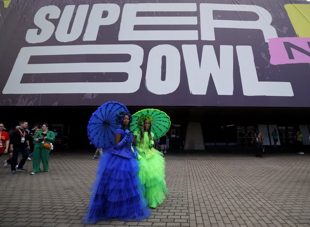 Football - NFL - Super Bowl LIX - Philadelphia Eagles v Kansas City Chiefs - Caesars Superdome, New Orleans, Louisiana, United States - February 9, 2025 Fans in fancy dress outside the stadium before the game REUTERS/Brian Snyder