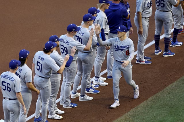 Enrique Hernández #8 of the Los Angeles Dodgers is introduced before Game Three of the Division Series against the Arizona Diamondbacks at Chase Field on October 11, 2023 in Phoenix, Arizona.