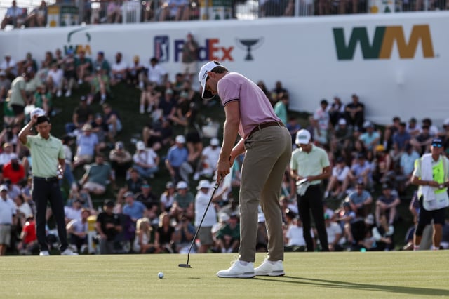 Feb 8, 2025; Scottsdale, Arizona, USA; Thomas Detry of Belgium putts his ball towards the 18th hole during the third round of the WM Phoenix Open golf tournament. Mandatory Credit: Aryanna Frank-Imagn Images
