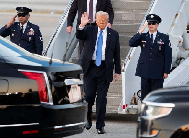 President Donald Trump waves after arriving on Air Force One to Palm Beach International Airport in West Palm Beach, Florida on February 7, 2025. Trump is expected to stay at his Mar-a-Lago home in Palm Beach before traveling to New Orleans on Sunday for the Super Bowl.