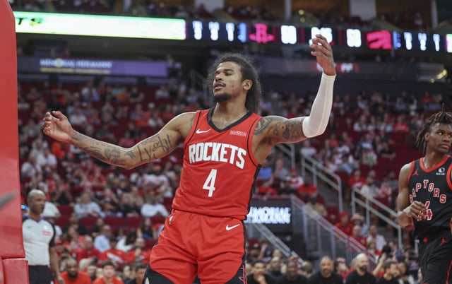 Feb 9, 2025; Houston, Texas, USA; Houston Rockets guard Jalen Green (4) reacts after a play during the game against the Toronto Raptors at Toyota Center. Mandatory Credit: Troy Taormina-Imagn Images