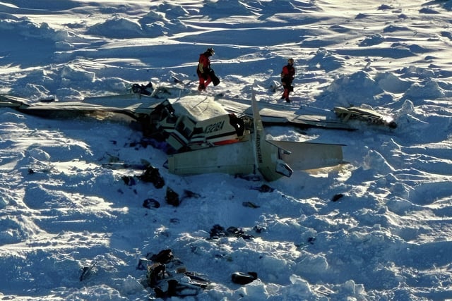 This photo provided by the U.S. Coast Guard on Friday, Feb. 7, 2025, shows a small commuter plane that crashed in western Alaska on a flight that was bound for the hub community of Nome.