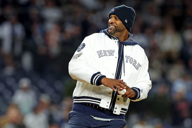 Oct 14, 2024; Bronx, New York, USA; New York Yankees former pitcher CC Sabathia throws the ceremonial first pitch before game one of the ALCS for the 2024 MLB Playoffs between the New York Yankees and the Cleveland Guardians at Yankee Stadium. Mandatory Credit: Brad Penner-Imagn Images/File Photo