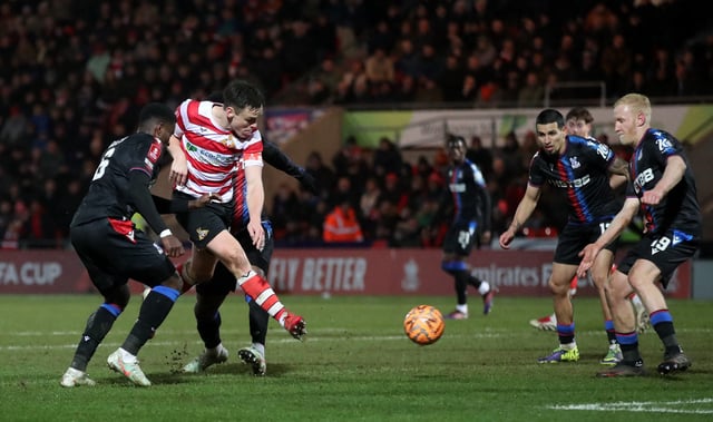 Soccer Football - FA Cup - Fourth Round - Doncaster Rovers v Crystal Palace - Eco-Power Stadium, Doncaster, Britain - February 10, 2025 Doncaster Rovers' Owen Bailey shoots at goal REUTERS/Scott Heppell