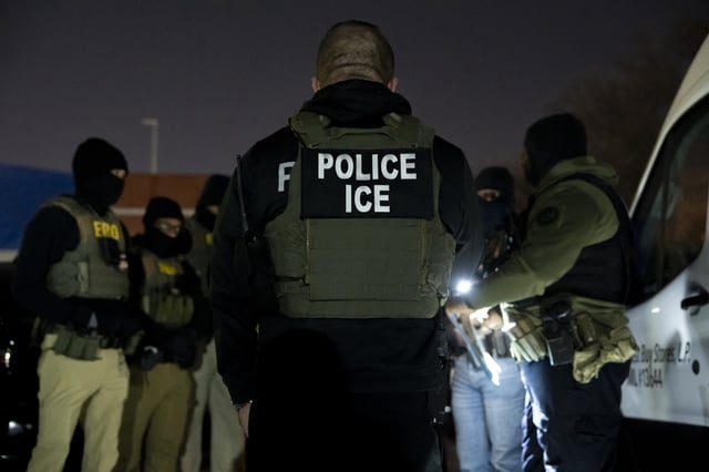 U.S. Immigration and Customs Enforcement officers gather for a briefing before an enforcement operation, Monday, Jan. 27, 2025, in Silver Spring, Maryland.