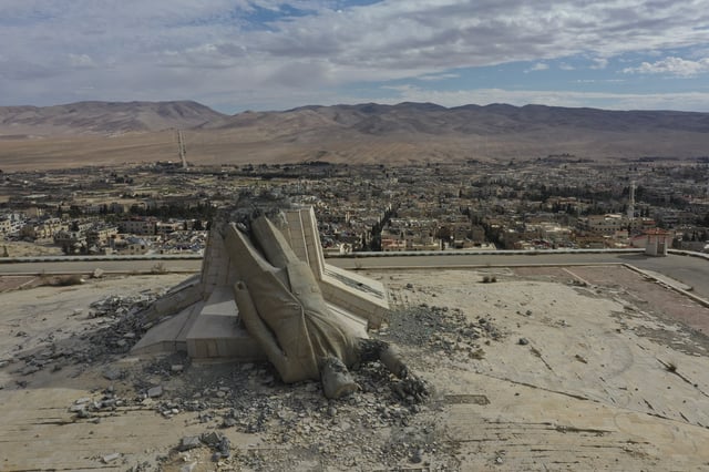 FILE - A statue depicting the late Syrian President Hafez Assad is seen on the top of a mount in Dayr Atiyah, Syria, Jan. 5, 2025. (AP Photo/Ghaith Alsayed, File)