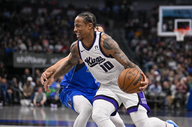 Feb 10, 2025; Dallas, Texas, USA; Sacramento Kings forward DeMar DeRozan (10) drives to the basket against the Dallas Mavericks during the second half at the American Airlines Center. Mandatory Credit: Jerome Miron-Imagn Images