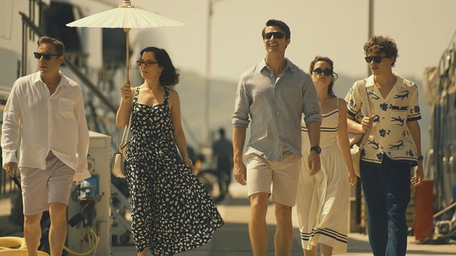 Jason Isaacs, left, Parker Posey, Patrick Schwarzenegger, Sarah Catherine Hook and Sam Nivola star as an American family visiting Thailand in Season 3 of HBO’s “The White Lotus.”