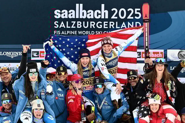 SAALBACH-HINTERGLEMM, AUSTRIA - FEBRUARY 11: Gold medalists, Mikaela Shiffrin and Breezy Johnson of Team United States, celebrate with teammates on the podium following victory in the Women's Team Combined during the Audi FIS Alpine World Ski Championships at Zwölferkogel on February 11, 2025 in Saalbach-Hinterglemm, Austria. (Photo by Christian Bruna/Getty Images)