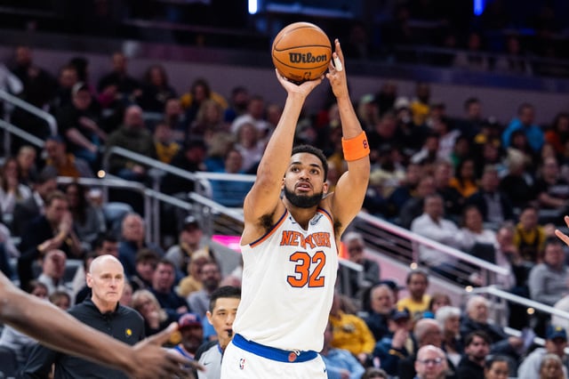 Feb 11, 2025; Indianapolis, Indiana, USA; New York Knicks center Karl-Anthony Towns (32) shoots the ball in the second half against the Indiana Pacers at Gainbridge Fieldhouse. Mandatory Credit: Trevor Ruszkowski-Imagn Images