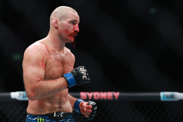 Sean Strickland of the United States of America and Dircus De Plessis of South Africa fight in their mddleweight title bout during UFC 312 at Qudos Bank Arena on February 09, 2025 in Sydney, Australia.