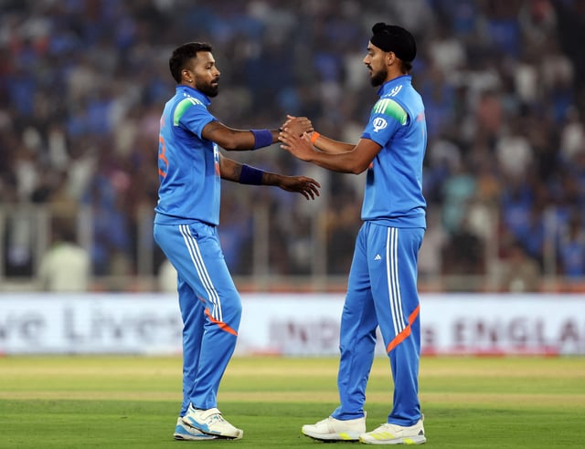 Cricket - Second One Day International - India v England - Narendra Modi Stadium, Ahmedabad, India - February 12, 2025 India's Hardik Pandya and Arshdeep Singh celebrate after the match REUTERS/Amit Dave