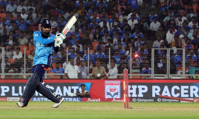 Cricket - Second One Day International - India v England - Narendra Modi Stadium, Ahmedabad, India - February 12, 2025 England's Adil Rashid is bowled out by India's Hardik Pandya REUTERS/Amit Dave