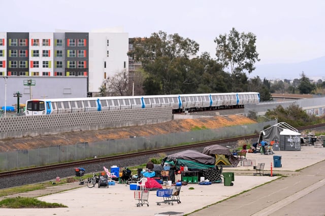 There are 12 homeless people living at "the slabs", an encampment that has stood under the overpass of Osgood Road and Washington Boulevard in Fremont for at least five years. A new camping ban Fremont is set to approve would make camping anywhere without permission from the city or the property owner a misdemeanor.