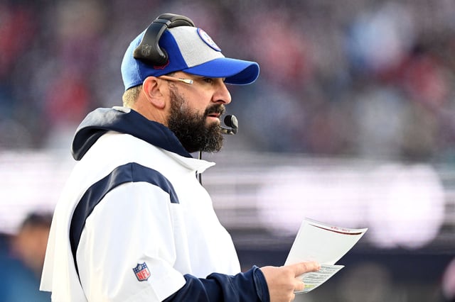 Jan 1, 2023; Foxborough, Massachusetts, USA; New England Patriots senior football advisor Matt Patricia watches a play against the Miami Dolphins during the second half at Gillette Stadium. Mandatory Credit: Brian Fluharty-USA TODAY Sports/File Photo