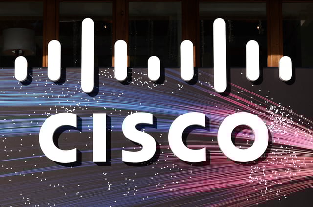 A logo of CISCO sits outside the company's house on the opening day of the 55th annual meeting of the World Economic Forum (WEF) in Davos, Switzerland, January 20, 2025. REUTERS/Yves Herman/File Photo