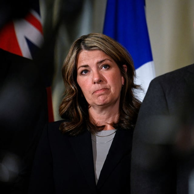 Danielle Smith, Premier of Alberta, looks on during a press conference with the premiers of Canada in Washington, D.C., U.S., February 12, 2025. REUTERS/Craig Hudson