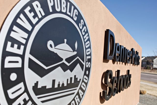 A Denver Public Schools emblem and sign on the Evie Garrett Dennis Campus that houses five separate schools with 1,600 students in Pre-K through 12th grade in Northeast Denver, Colorado on March 16, 2016.