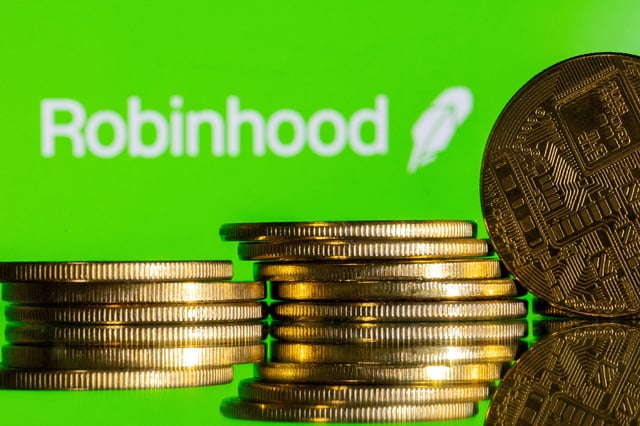 Robinhood logo and representations of cryptocurrency are seen in this illustration taken December 12, 2023. REUTERS/Dado Ruvic/Illustration/File Photo